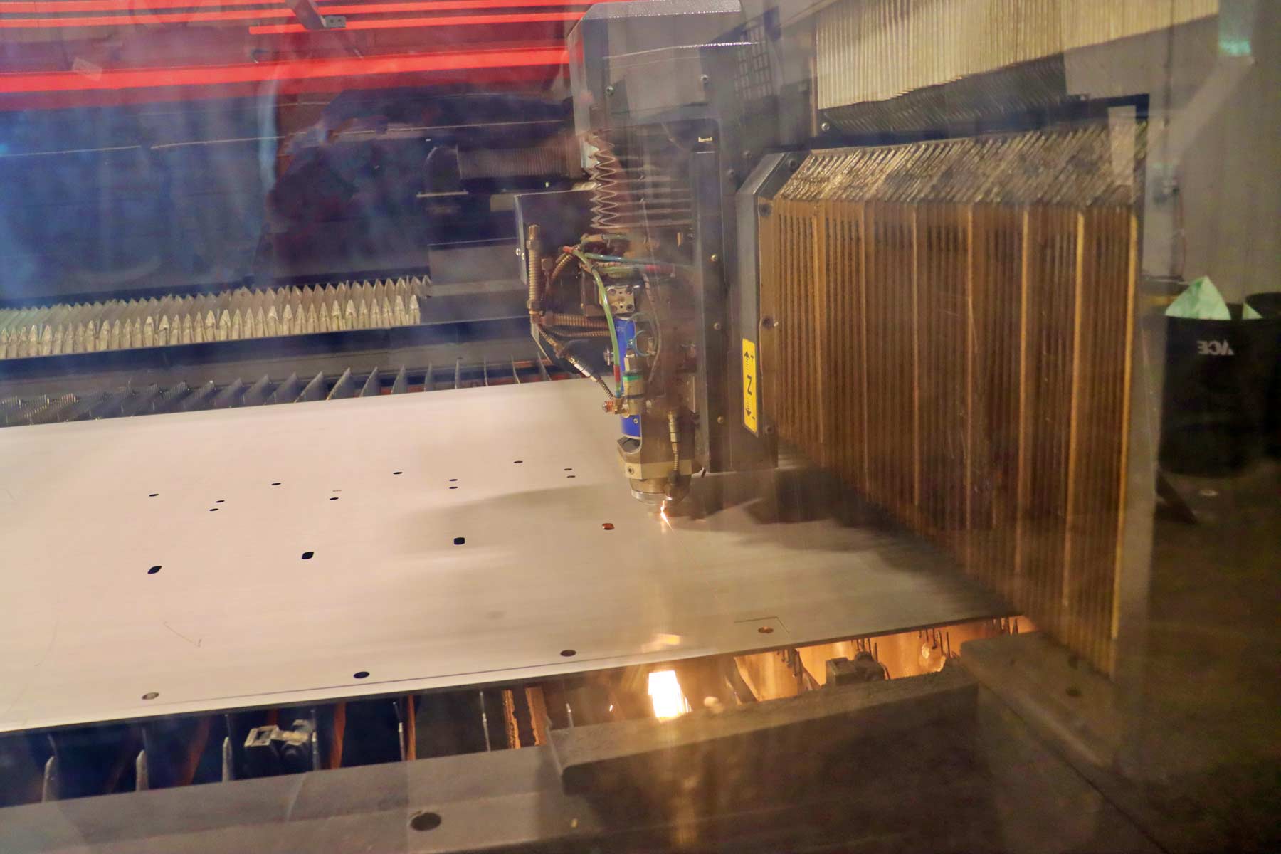view into amada laser machine while cutting