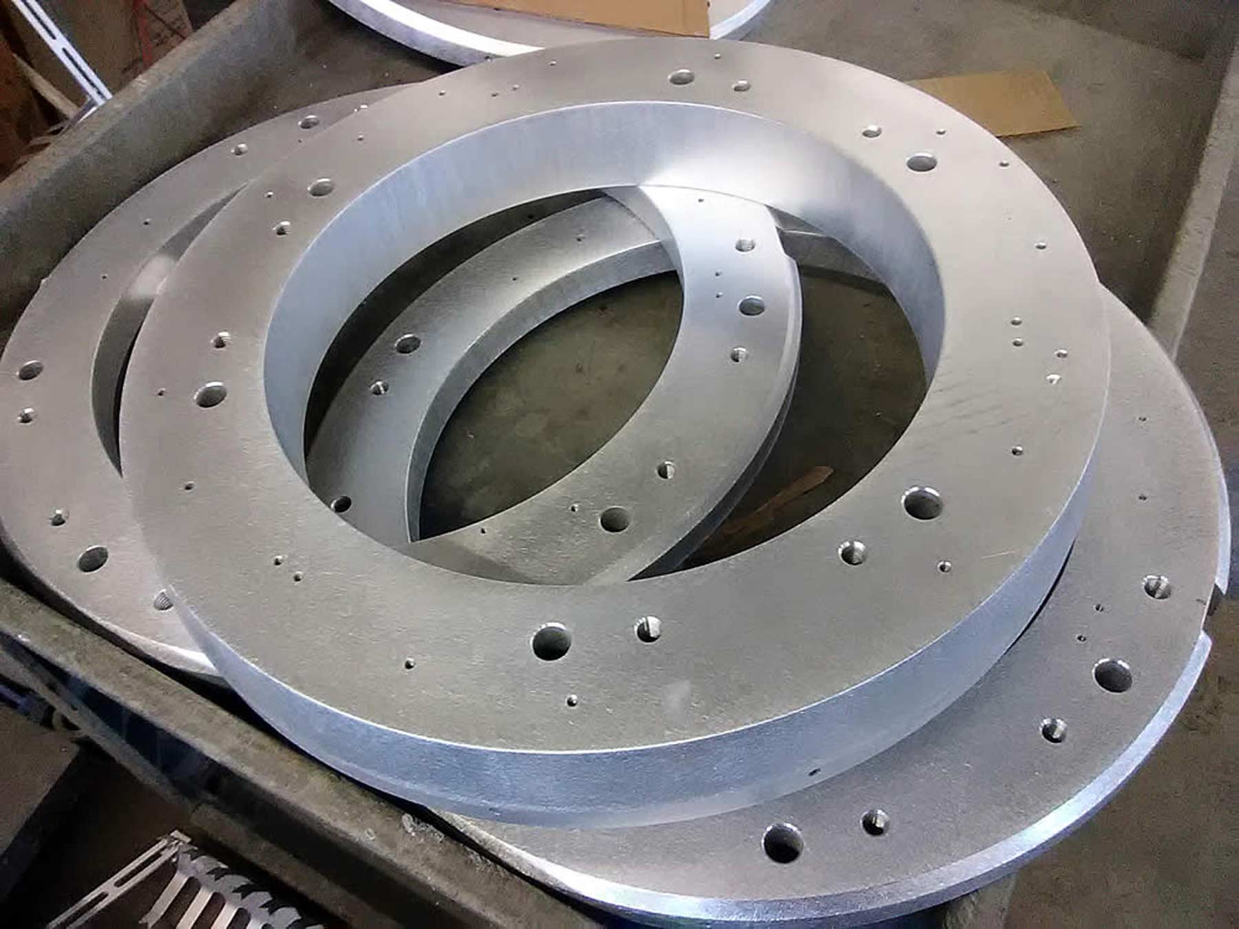 silver anodized aluminum circular pieces